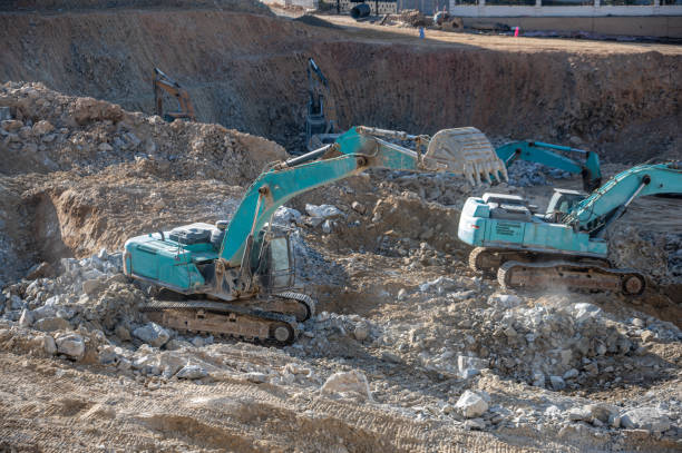 The excavator on the construction site is working