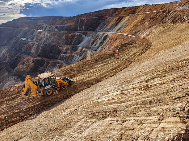 Construction machinery working in open pit mine